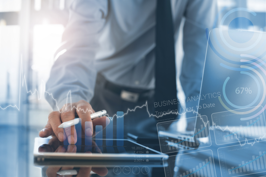 A man analyzing data on a tablet